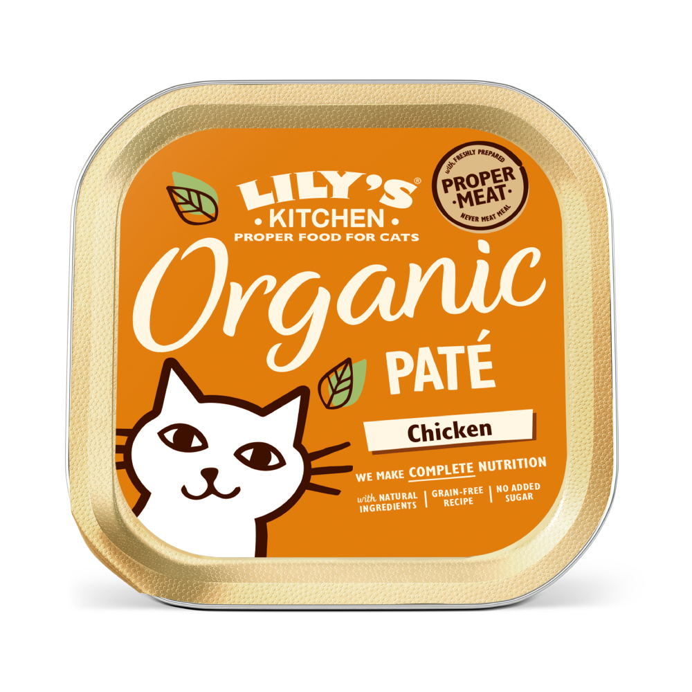 A container of Lily's Kitchen Organic Pâté with chicken flavor for cats. The packaging is orange with an illustration of a smiling cat and text indicating the product is organic.