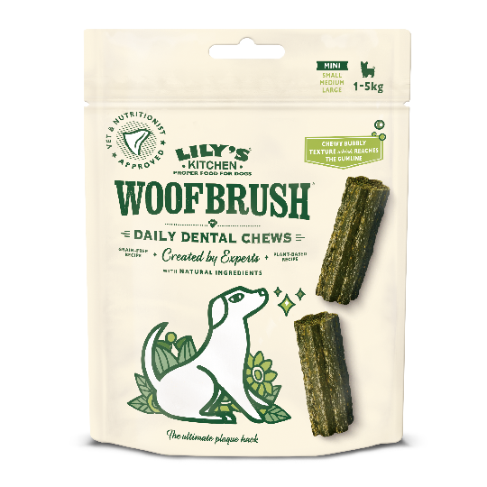 Packaging of Lily's Kitchen Woofbrush dental chews for dogs featuring the product visible through a transparent window, with green and white branding elements and a depiction of a dog.